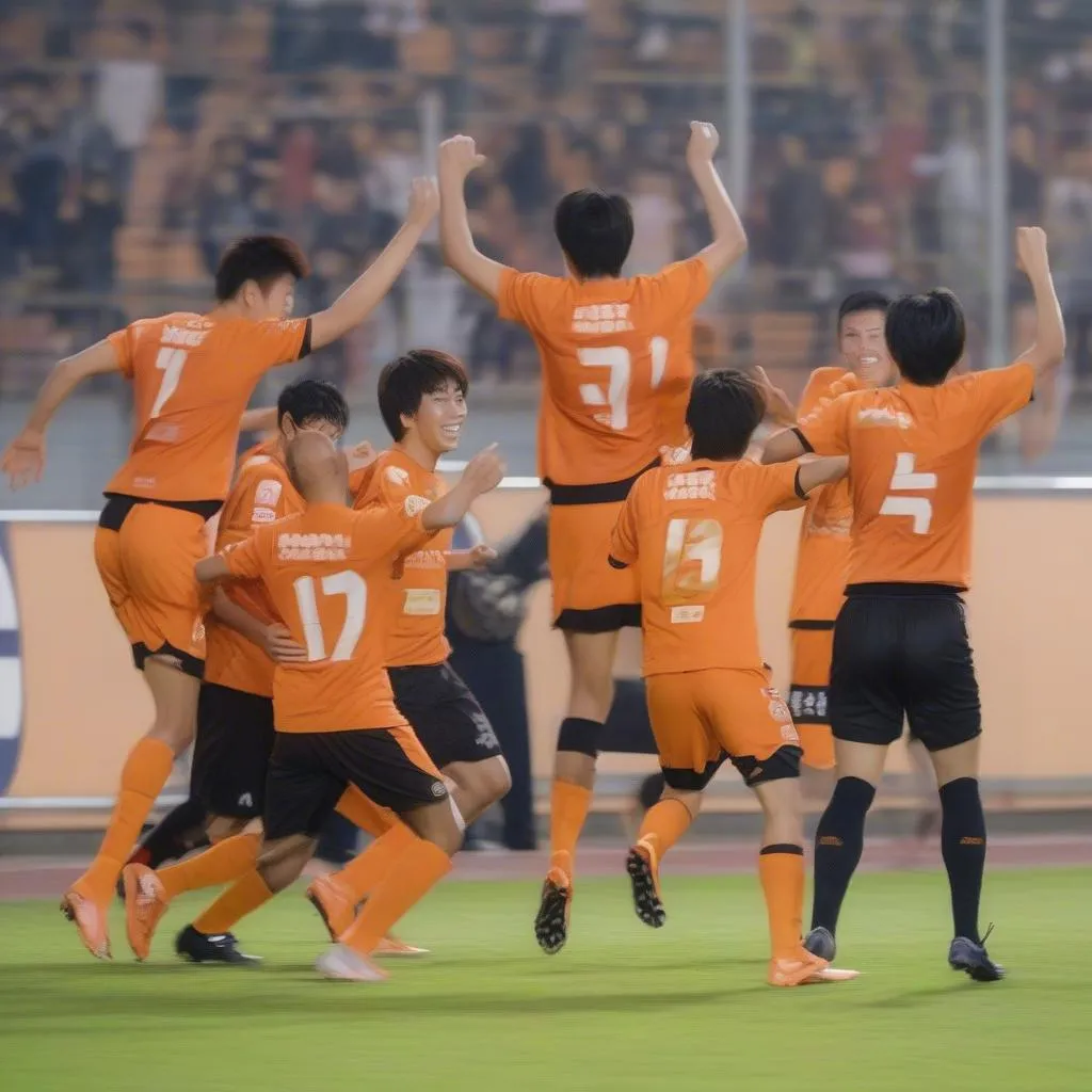 Các cầu thủ Ehime FC ăn mừng bàn thắng